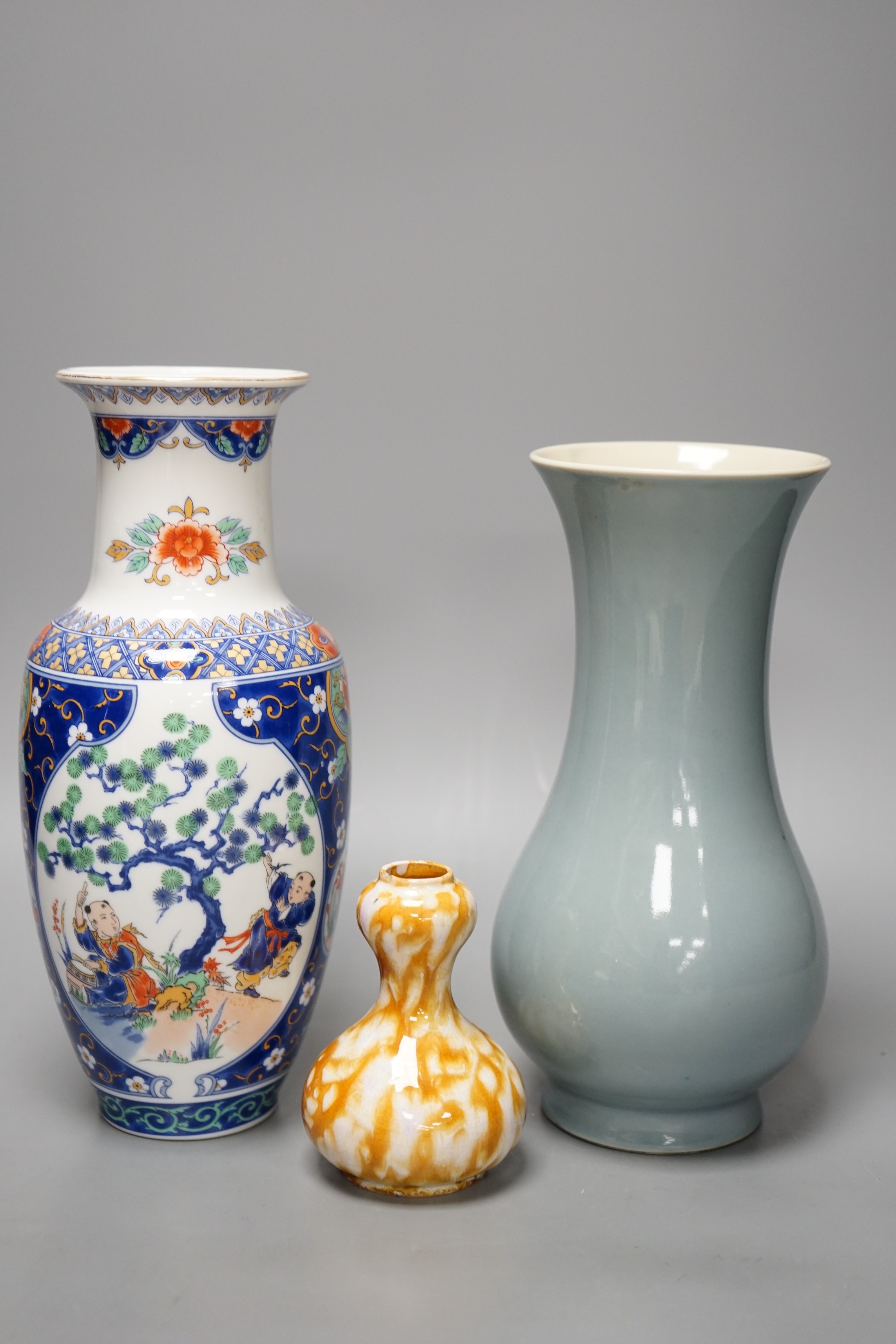 A Chinese Clair De Lune glazed baluster vase and two other Chinese vases. Tallest 26.5cm